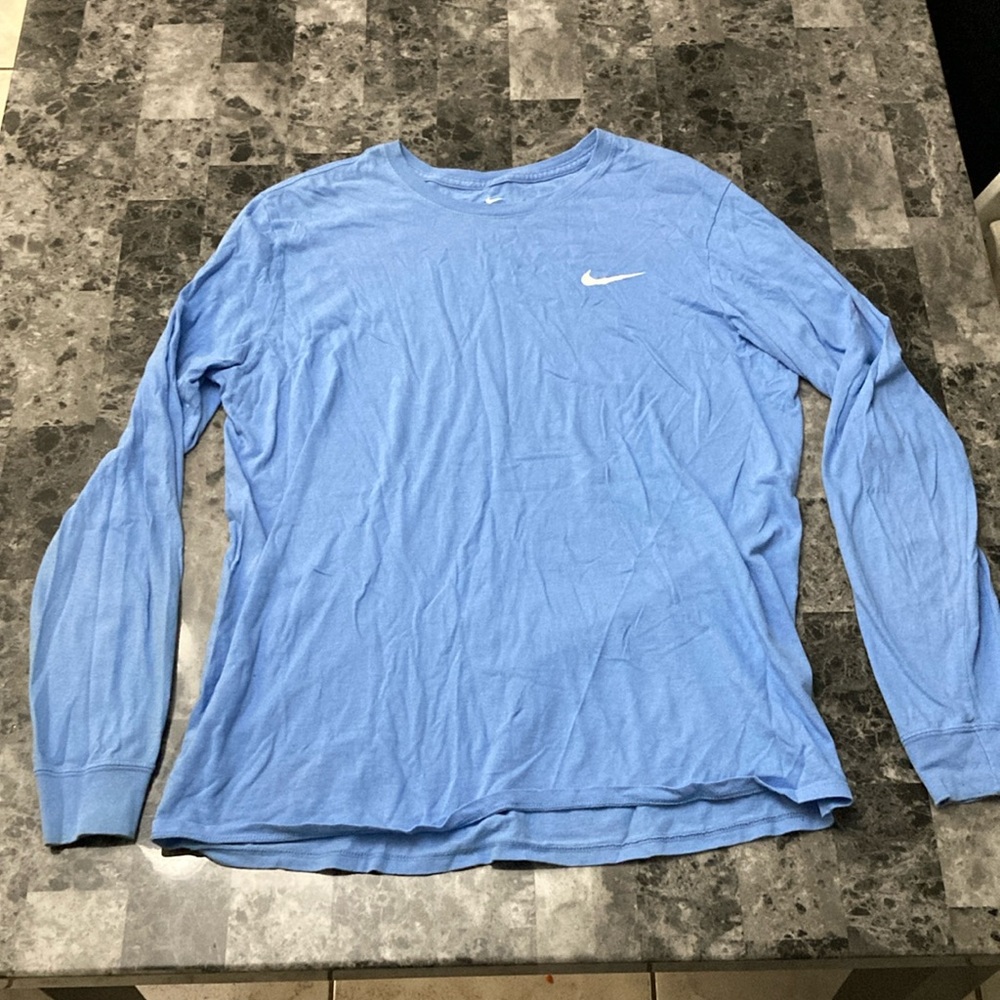 A men’s large blue Nike long sleeve shirt